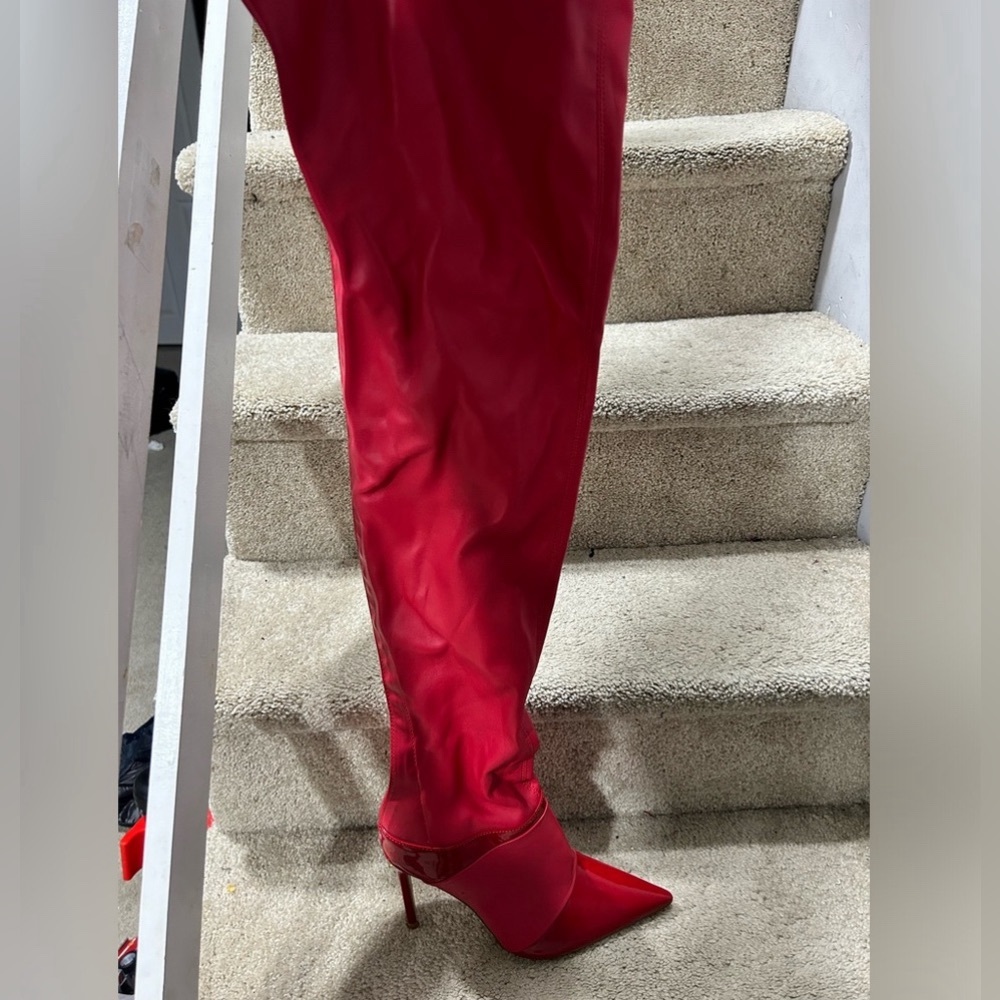 Red thigh high boots